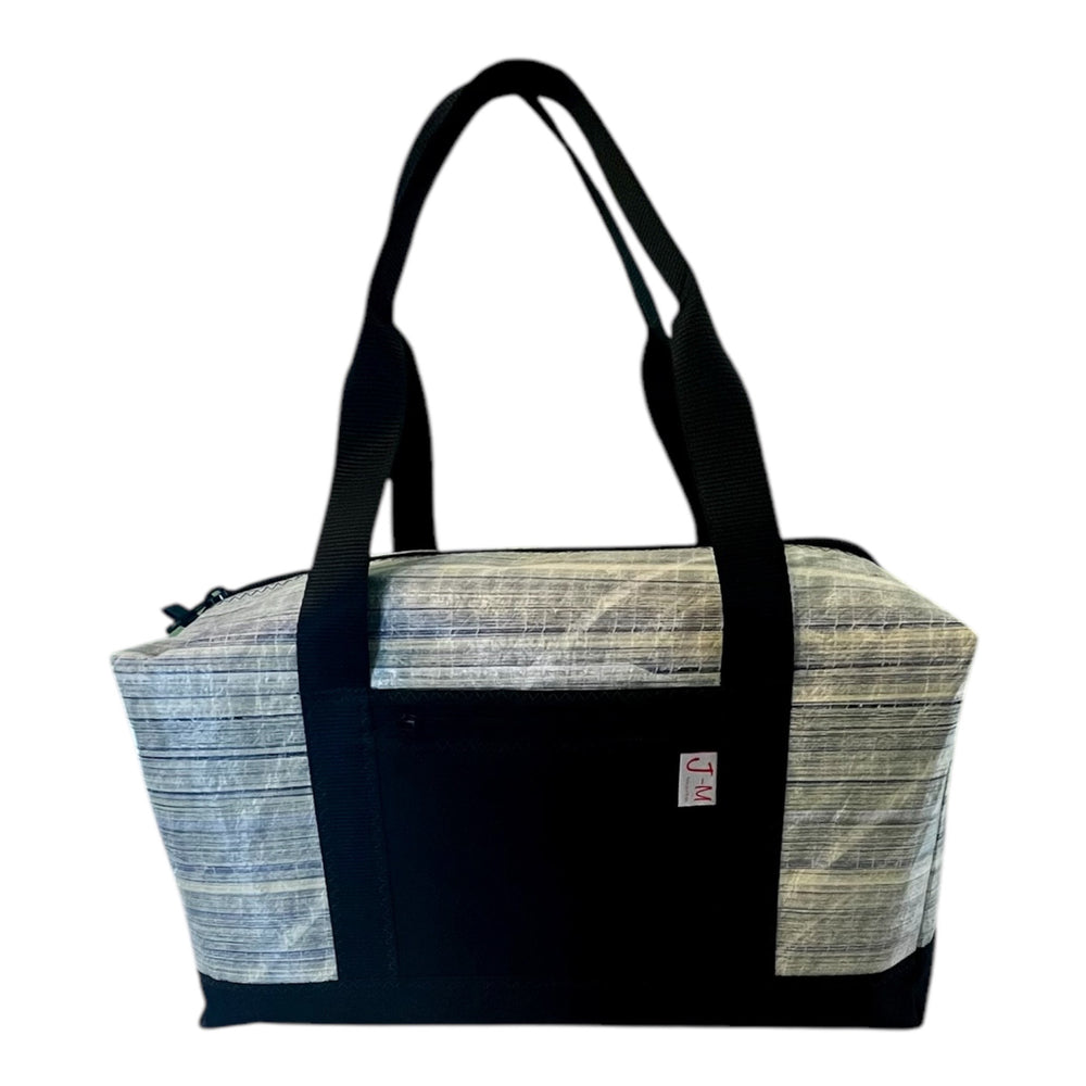Handcrafted from ETNZ sailcloth carryall