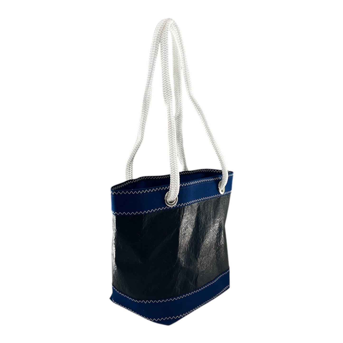  Handcrafted in Italy, this bag is made from an upcycled sail that competed in the America’s Cup events by the French Orient Express Racing team, giving it a unique blend of performance heritage and sustainable style.