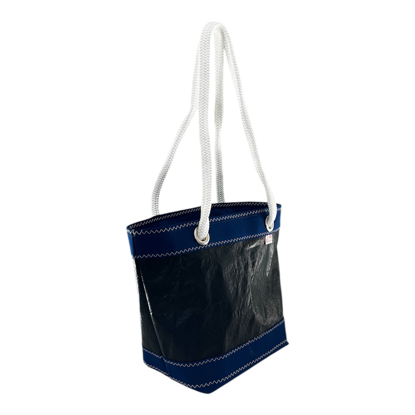  Handcrafted in Italy, this bag is made from an upcycled sail that competed in the America’s Cup events by the French Orient Express Racing team, giving it a unique blend of performance heritage and sustainable style.