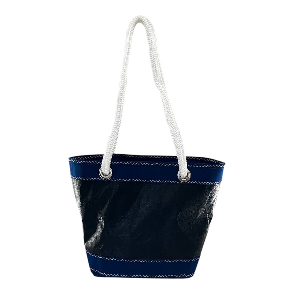 
                  
                     Handcrafted in Italy, this bag is made from an upcycled sail that competed in the America’s Cup events by the French Orient Express Racing team, giving it a unique blend of performance heritage and sustainable style.
                  
                