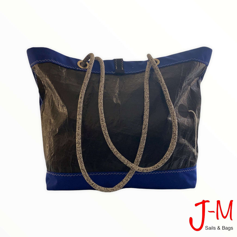 
                  
                    Shopping tote Delta, black 3Di / blue handcrafted by J-M Sails and Bags, back side
                  
                