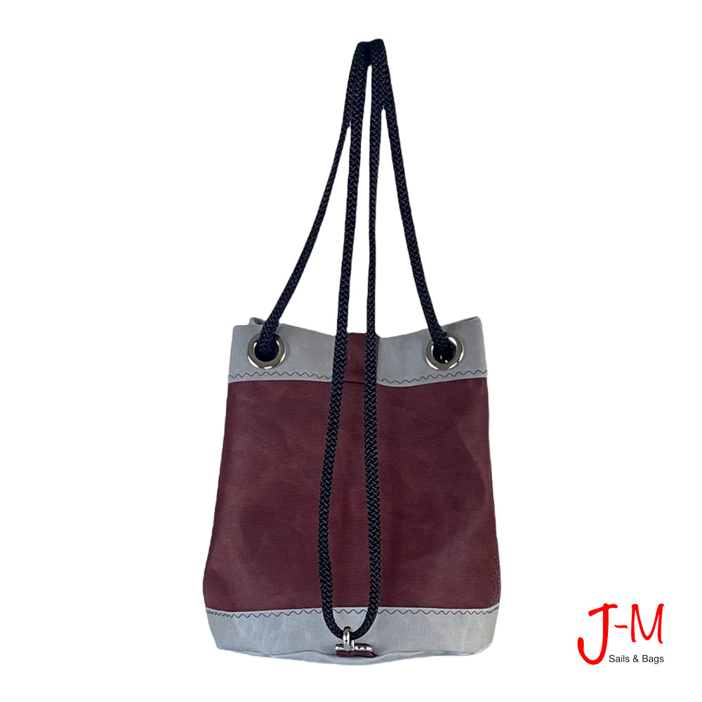 
            
                Load image into Gallery viewer, Bucket bag Charlie, bordeaux / grey recycled sailcloth by j-m sails and bags backside view
            
        